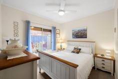 34 Talbot Ave North Plympton SA 5037 $795,000 - $840,000 Contemporary and easy-care with gorgeous street appeal, this 2001-built courtyard could not be in a more favourable North Plympton position. With the Rex Jones Reserve and Playground almost a quite literal extension of its courtyard, and the Westside Bikeway, Weigall Oval Reserve and West Torrens Dog Park all within easy walking distance, restless legs will find easy respite in any direction. Kurralta Park Shopping Centre, schools and transport are readily accessible in a wonderful location central to city and sea. A beautiful façade and fenced manicured gardens make a fine first impression, before a formal entry allows for direct access to a front positioned master bedroom – the first of three – with split system air conditioner, walk-in robe and two-way ensuite bathroom with bath, shower and separate powder room. A galley-style kitchen with new dishwasher, island bench and raised breakfast bar overlooks a dining and living space with northerly aspect sliding doors onto the courtyard. Double doors from the living open onto the third bedroom, which would also happily act as a play room or home office. Outside, a north-easterly aspect courtyard is made beautifully private by slatted timber fencing and stone-look accents plus raised garden beds and a world of greenery. Delight in the details: - Polished timber flooring to living area - Split system aircon in living - Ceiling fans in bedroom and living area - Linen storage - Double garage with internal access + off-street parking Absolutely position-perfect. Lots to love about this one.