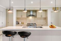 10 Casuarina Way Buronga NSW 2739 $649,000 - $713,000 Damian Portaro, Principal & Chairman's Elite Sales Agent at Ray White Mildura, is proud to present for sale your dream family home in the charming and peaceful locale of Buronga. This immaculate four-bedroom house offers a perfect blend of space, comfort, and modern conveniences to suit the needs of families and first home buyers alike. Set on an expansive 891m2 block, the property promises plenty of room for growth and endless opportunities for outdoor activities and entertaining. As you step inside, be greeted by the light-filled, open plan kitchen, living and dining area. The contemporary kitchen boasts stunning stone benchtops and a walk-in pantry, ensuring the heart of the home caters to all your culinary desires. The clever design also incorporates a separate second living room, providing the ideal retreat for more intimate gatherings or relaxation. The master suite serves as a sanctuary, complete with a walk-in robe and ensuite, while the three remaining bedrooms offer ample space for children, guests or even a home office. With evaporative cooling and split system heating and cooling, you'll enjoy year-round comfort throughout the property. Outside, an inviting bungalow provides versatile living options or additional storage space. The impressive shed comes equipped with power, water, evaporative cooling, and a mezzanine floor, catering to the needs of hobbyists and DIY enthusiasts. The crowning glory of this fantastic property is the inground pool, perfect for cooling off during the warm summer months. Surrounded by neat gardens and offering plenty of space for alfresco dining and play, this outdoor oasis is bound to become a favourite spot for the whole family. With two parking spaces and a wealth of fantastic features, don't miss your opportunity to secure this outstanding family home.