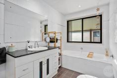 21 Albacore Drive Corlette NSW 2315 Surrounded by well-maintained residences in a family-friendly neighbourhood, this free-standing, low maintenance home offers both space and convenience in a street known for its pride in homeownership. As you approach, you're greeted by lush gardens framing the entrance, hinting at the care and attention to detail found within. Stepping inside, the open-plan living, kitchen, and dining area immediately captivates with its polished timber floorboards, contemporary downlights and the comfort of split-system air conditioning. This space effortlessly transitions from casual family living to hosting gatherings with friends and loved ones. The kitchen boasts a welcoming ambiance, abundant cupboard & bench space and a suite of high-quality stainless-steel appliances, making meal preparation easy. Beyond lies an outdoor undercover balcony, where leafy green trees provide a tranquil backdrop for moments of relaxation and enjoyment. Also located on the main level is the spacious master bedroom, allowing you the opportunity to live on the one level. Featuring an ensuite, build in robe and ceiling fan. Downstairs offers two generously proportioned bedrooms and a rumpus room, the ideal space for the kids seeking comfort and privacy. Towards the rear, a low-maintenance manicured backyard awaits, complete with verdant trees enhancing the sense of serenity and privacy. For added convenience, a double lock-up garage provides secure parking for vehicles, while the home's proximity to Salamander Bay Shopping Centre, schools, parklands, and beaches ensures easy access to essential amenities and leisure activities. Whether unwinding at home or exploring the surrounding area, this property offers a harmonious blend of comfort, style, and convenience for even the most discerning buyers.