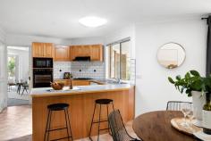 9 Allchin Avenue Mornington VIC 3931 $900,000 - $990,000 Setting an uncomplicated backdrop to modern living in the heartland of Mornington's family-friendly neighbourhood, this single-level design brings people together across an easy-care landscape of 621sqm (approx.). Met with dual living zones, central kitchen and a private alfresco, a free-flow of family living orientates towards north to ensure an all-day sun streams across the zones that matter. Inspiring a hub of social gatherings, a continuous entertaining layout centres a sunlit kitchen equipped with a wall oven, gas cooktop and breakfast bar, while an alfresco servery window creates a seamless connection between indoor and outdoor entertaining spaces. Both formal and family living zones continue to establish the indoor-outdoor connection, opening up to the alfresco to amplify space for every occasion. Catering to the needs of families with four generous bedrooms, including a private master bedroom with updated ensuite and walk-in robe, and main bathroom with private toilet. For those seeking working-from-home space, the fourth bedroom can double as a study if required, with a central position allowing an eye on little kids if needed. Complete with gas ducted heating, evaporative cooling, easy-care rear gardens ready for a green thumb, and a double garage, this sensational starter, investment or young family home presents only moments from Bentons Square Shopping Centre, Bentons Junior College, Mornington's coastline and public transport.