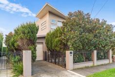 43 Nolan Street Frankston VIC 3199 $1,150,000 - $1,265,000 Discover the epitome of intelligent design and spacious living in this remarkable 4-bedroom townhouse, offering a relaxed lifestyle in a coveted beachside locale. Positioned opposite Victoria Park in the esteemed Frankston High School Zone, this home is just a stone's throw from all that Frankston has to offer, including its sunny beaches. The main floor features an open-plan layout with a brand new kitchen, surrounded by stone bench-tops. Spacious dining, and living areas leading to an outdoor entertaining balcony. A gas log fireplace in the lounge adds warmth and charm, while a separate private study provides the perfect home office space. The upper level is dedicated to the luxurious master bedroom, boasting a walk-through robe, private ensuite, and French doors opening to a Juliet balcony overlooking the park. The remaining bedrooms feature built-in robes and are serviced by a central bathroom with spa bath. On the lower floor, a large additional bedroom, third bathroom, and living zone with access to the rear courtyard create a private retreat ideal for guests, in-laws, or teenagers. Additional features include three reverse cycle split system air conditioners, freshly installed carpet, for luxurious comfort, a remote lock-up single garage, off-street parking, and easy access to amenities, transport, and the Peninsula's major arterial road.