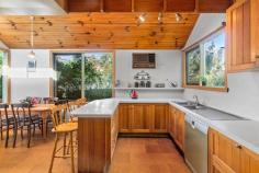35 Everton Grove Surrey Hills VIC 3127 $1,950,000 - $2,145,000 This charming abode on a large block offers substantial family-friendly accommodation in a coveted leafy locale. With a rear gate opening directly onto Bluebell Hill playground, reserve and tennis club, a slice of family paradise awaits the savvy buyer. The existing four-bedroom house has original heritage features, including grand high ceilings, floorboards and architraves, and has been modernised at the rear. Nestled quietly in a verdant side street, this premium property has easy access to the new Union Station, Aqualink/Surrey Park, Maling Road, Wattle Park Village and bus services. The lovely home is extremely liveable as is, or build a new dwelling subject to council approval to make the most of this perfect position. It boasts an elegant formal living room with bay window and fireplace, with a generous dining room connected through a decorative archway. At the rear there is a casual living area, also with fire place, with ample built-in storage and leads out to a paved alfresco patio through bifold doors with retractable screens. It includes a kitchen with Bosch dishwasher and Smeg oven, soaring ceilings and dining area with verdant views. The master bedroom features a walk-in robe and ensuite and is complemented by an additional bedroom/study towards the front of the house. Two more robed bedrooms share a family bathroom with separate bath and shower and enjoy a pleasing outlook over the expansive grassy backyard. Amenities also include powder room, separate laundry with storage, solar panels, ducted heating, ducted vacuum and numerous split system units, a built-in bbq, outdoor shed with wood storage, charming pond with frogs,. Zoned for Surrey Hills Primary School and Camberwell High School and in easy access to the city's best private schools.