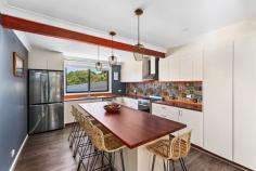 13 Short Street Helensburgh NSW 2508 $1,300,000 - $1,350,000 Tucked away in a quiet cul-de-sac, this four-bedroom European-inspired residence seamlessly combines convenience and style. Located in a central yet tranquil setting, this tastefully renovated home features open-plan living areas, a cosy lounge, and ample entertaining options. YOUR HOME • Situated on an impressive 557m2 plot, this property provides ample outdoor space for various activities. The backyard offers a tranquil space for children and pets to play safely. Step outside to the spacious covered entertainment area and bask in the peaceful, elevated view of the lush surroundings. • The well-thought-out layout of the house creates a warm and inviting atmosphere. • Each bedroom is furnished with a built-in wardrobe and the master an ensuite, this home ensures a comfortable retreat for all occupants. • Conveniently located, this property is just a short distance from local amenities, schools, and shops, striking a perfect balance between peaceful, rural living and urban convenience. • The property includes a designated area suitable for a teenage retreat, a fifth bedroom, hobbies, a home office or a perfect spot for those seeking a quiet escape. LOCATION: • One of Helensburgh's most convenient locations, positioned toward the end of a quiet cul-de-sac street with no thoroughfare traffic and quick access to town amenities. • Helensburgh train station only a few minutes drive from your front door and bus stops just a moment's walk, fantastic for those commuting on public transport. • Local cafes, schools, shops and restaurants are all only minutes walking distance away. • Immerse yourself in nature with the Royal National Park and Stanwell Park Beach nearby. • Helensburgh is located approximately 1 hour South of Sydney CBD and approximately 30 minutes North of Wollongong CBD. • Embrace the quintessential coastal lifestyle and all that comes with it... swimming, fishing, bushwalking, hang gliding and family picnics in popular parklands all available only moments from your doorstep.