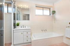 1/34 Irvine Street Kiama NSW 2533 $860,000 - $940,000 Bathed in natural light and centrally located within Kiama township, this unique duplex offers a move-in ready residence as is with potential to make it your own. Solidly built and well cared for, offering a convenient single level design with open plan living and low maintenance yard, you can enjoy the benefits of having all of the local amenities and services Kiama has to offer so close to your front door. Featuring 3 bedrooms with BIW's including master with ensuite and walk-in robe, open plan main living area with bay window, 2 original well kept bathrooms, timber kitchen with electric appliances, split-system A/C, spacious single garage with internal/remote access, plenty of under house storage, and a private secure low maintenance yard with established gardens. Situated in the heart of Kiama just 800m from local shops, cafes, and restaurants, properties of this kind are rarely offered to the market and it's sure to appeal to a wide range of buyers whether you're looking for your first home, investment, or great option to downsize.
