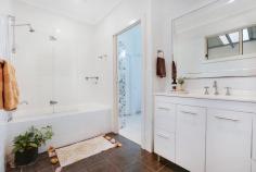 22 Lakelands Drive Dapto NSW 2530 $750,000 - $790,000 Welcome to this exquisite 4-bedroom home, where modern elegance meets timeless charm. Step inside to discover high ceilings adorned with ornate cornices, adding a touch of grandeur to every room. The recently modernized interior boasts a brand new kitchen featuring 40mm benchtops, a sleek glass splashback, and the convenience of a dishwasher. The modern bathroom, complete with a second toilet in the laundry, offers both style and functionality. Entertain guests effortlessly on the expansive covered entertainment area, perfect for alfresco dining or relaxing in the fresh air. Situated on a level 658m2 block, this property includes a convenient drive-through garage and additional storage sheds for all your storage needs. Enjoy the proximity to parks, playing fields, and easy freeway access, making this home the epitome of comfort, style, and convenience. HIGHLIGHTS • 4 bedrooms • Modern kitchen with glass splashback and dishwasher • High ceilings with ornate cornices • Modernised bathroom with second toilet in laundry • Covered entertainment area • Drive through garage and sheds • Level 658m2 block • Close to parks and playing fields • Close to freeway access