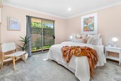 1/34 Irvine Street Kiama NSW 2533 $860,000 - $940,000 Bathed in natural light and centrally located within Kiama township, this unique duplex offers a move-in ready residence as is with potential to make it your own. Solidly built and well cared for, offering a convenient single level design with open plan living and low maintenance yard, you can enjoy the benefits of having all of the local amenities and services Kiama has to offer so close to your front door. Featuring 3 bedrooms with BIW's including master with ensuite and walk-in robe, open plan main living area with bay window, 2 original well kept bathrooms, timber kitchen with electric appliances, split-system A/C, spacious single garage with internal/remote access, plenty of under house storage, and a private secure low maintenance yard with established gardens. Situated in the heart of Kiama just 800m from local shops, cafes, and restaurants, properties of this kind are rarely offered to the market and it's sure to appeal to a wide range of buyers whether you're looking for your first home, investment, or great option to downsize.