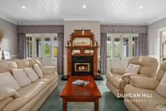41F Sunninghill Ave Burradoo NSW 2576 Set against a backdrop of lush park-like gardens, this property offers a picturesque outlook that invites tranquillity into everyday living. With its north-facing orientation and expansive verandahs, bask in the warmth of the sun while enjoying unparalleled privacy. Inside the timeless Harkaway Home lies a haven of comfort, complemented by a multipurpose studio that stands fully detached. Whether you're nurturing your creativity in an art studio, indulging in your hobbies in a mechanic workshop, or prioritising your wellness in a private gym with its own bathroom, "The Elms" offers limitless opportunities for fulfilment in a setting where privacy and natural beauty converge. Welcome to a lifestyle redefined. Features include: Ducted central heating Gas log fire “Heat Charm” with granite hearth Split-system air conditioner Entrance foyer 9-foot ceilings Open-plan kitchen/dining room with access to undercover outdoor entertaining area Living area with access through French doors to a second undercover outdoor entertaining area Surround-sound in media room with bi-fold doors for privacy Bespoke features including dado rails, stained-glass windows and lining boards Ilve 5 burner gas hob Westinghouse wall oven Bosch dishwasher Glass splash backs Stone bench tops Island bench Main bedroom with ensuite and bay window seat Bedrooms 2 and 3 with built-in wardrobes and picture windows Main bathroom with bath Attic storage Linen Press Laundry with external access Double garage with electric door Carport Open-air parking Concrete driveway Multiple-purpose studio (converted stable) with lacquered concrete floor, bathroom, storage area and bifold doors Security alarm Fenced vegetable patch Barn-style garden shed with double door and pedestrian access Utility shed Tank for grey water Established parkland garden including cypress hedging, elms, evergreen magnolia, and camellias