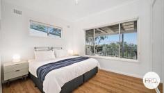 19 Irambang Street Nelson Bay NSW 2315 Nestled amidst lush greenery, this coastal abode presents a seamless blend of modern comfort and natural beauty. Enveloped by established landscaping, the home exudes tranquility and privacy, offering a serene retreat from the bustling world outside. Step onto the inviting timber entertaining deck, where filtered water views beckon you to unwind and soak in the coastal splendor. A swinging chair sways gently in the breeze, offering a tranquil spot to relax and savor the scenic vistas. After a sun-soaked day at the nearby beach, rinse off in the outdoor shower, surrounded by the soothing sounds of nature. Inside, the fully renovated home boasts floating timber flooring throughout, enhancing the contemporary aesthetic while providing warmth and durability. Oversized glass sliding doors bathe the interiors in natural light, creating a bright and airy atmosphere that seamlessly merges indoor and outdoor living spaces. Two spacious living areas offer versatile spaces for relaxation and entertainment, while a modern kitchen awaits culinary adventures. Adorned with stone benchtops, shaker style cabinetry, and stainless steel appliances, including a breakfast bar for casual dining, the kitchen is both stylish and functional. Retreat to one of three generously sized bedrooms, each adorned with mirrored built-in wardrobes for ample storage. The main bathroom is a haven of tranquility, boasting a skylight, timber panelling, and a convenient double vanity, inviting you to indulge in moments of relaxation and rejuvenation. Unbeatable location having the beach literally at the end of the street, whilst also being positioned between the Salamander Shopping Centre and the Nelson Bay CBD which offers shops, restaurants, cafes, marina and more! Additional features include an internal laundry with direct outdoor access, ducted air conditioning for year-round comfort, and LED lighting for energy-efficient illumination. Whether you're unwinding on the deck, entertaining in the living areas, or enjoying the coastal lifestyle, this home offers the perfect blend of luxury, comfort, and natural beauty.