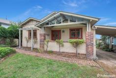 47 Dangar Street Armidale NSW 2350 $485,000 - $525,000 Perched atop the tranquil North Hill of Armidale, 47 Dangar Street offers a picturesque retreat with captivating views of the surrounding area. This inviting three-bedroom residence exudes character and warmth, making it an ideal haven for both first-time buyers and downsizers alike. Stepping inside, you’ll be greeted by a sense of timeless charm and comfort. The spacious layout encompasses three generously sized bedrooms, complemented by a versatile study area, catering perfectly to your modern lifestyle needs. The heart of the home lies within its country timber-style kitchen, where timeless elegance meets functionality. Here, culinary delights are effortlessly crafted amidst the warmth of rich timber accents. Convenience meets sophistication with two well-appointed bathrooms, strategically placed for accessibility and privacy. One adjoins the bedrooms at the front of the home, while the other sits adjacent to the laundry area. The rear of the residence unveils a spacious carpeted living room, adorned with exposed brick feature walls while double doors lead to the expansive undercover deck. Perfect for entertaining or simply unwinding in the tranquility of the outdoors, this space seamlessly blends indoor and outdoor living. Throughout the home, character features abound, including timeless floorboards, an inviting open fireplace, and charming exposed brick elements, adding a touch of elegance to every corner. Additional features include a convenient single carport, ducted gas heating for year-round comfort, a practical garden shed for storage needs, all nestled on a generously sized block of 690 square meters.