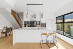 5/3 Lord Street Doncaster East VIC 3109 $950,000-$1,045,000 This newly constructed townhouse boasts four bedrooms and three bathrooms, epitomizing sophistication and top-tier quality with cutting-edge architectural design are located in the heart of Doncaster East and are certain to exceed your expectations and living conditions. They are very ideal because of their enormously roomy living areas, well-equipped kitchen, and highly desired location. Features include: Ground Floor: Spacious open-plan living and dining area leading to an airy east-facing terrace with tri-slide doors Stunning stone kitchen with a convenient window servery to the outdoor dining area, equipped with stainless steel appliances such as oven, 5-burner gas stove, and dishwasher, complemented by a mirrored splash-back Guest suite or secondary master bedroom with a fully-tiled ensuite and walk-in wardrobe Fully-tiled ensuite with a stone vanity, spacious frameless glass walk-in shower, and toilet Basement: Flexible space suitable for a gym, cellar, or storage room Separate laundry with stone benches, ample storage, and provision for a front loader washing machine Oversized double automatic garage with shelving and internal access First Floor: Two additional double bedrooms Impressive fully-tiled main family bathroom Expansive master bedroom with a fully-tiled ensuite, built-in wardrobe Additional Features: Zone ducted heating and reverse cycle ducted air conditioning Video intercom system Security alarm Elegant American Oak flooring and plush carpets Sleek tri-level design with high ceilings Situated in the sought-after school zones of Doncaster Gardens Primary School and Doncaster Secondary College, this property is conveniently located behind Jackson Court Shopping Centre, with easy access to Saints Peter & Paul's Primary School, parks, Devon Plaza, and bus routes to Westfield Doncaster and the city.