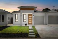 33 Tarranna Ave Plympton Park SA 5038 $797,500- $820,000 Torrens Titled with a street frontage position along the tree-lined Tarranna Avenue, this brand-new courtyard home is super sleek from start to finish. A crisp white façade with timber accents offers instant street appeal before a front porch entry opens to reveal a central hallway lined with timber floors. Enjoying front position and a lovely street outlook, a comfortable master bedroom is complete with a walk-through robe and beautiful ensuite bathroom with floating vanity and full-height tiling. A further two bedrooms are serviced by a spacious main bathroom with deep freestanding bath, shower and large vanity. Open, airy and flooded with natural light, a north-facing kitchen, dining and living space is warm and welcoming, arming home cooks with a large gas cooktop, plenty of storage space and an island with dishwasher, breakfast bar and double undermount sink. Sliding doors open onto a private, easy-care courtyard with lawn strip and side access. Delight in the details: - Ducted reverse cycle air conditioning - Built-in robes to bedrooms 2 & 3 - Separate laundry with linen storage - Secure single garage with internal access + extra off-street parking Walk to Cowra Crescent Reserve, the bus, takeaway options and local shops, while the train, schools, Edwardstown Oval and Castle Plaza and Westfield Marion Shopping Centres are within easy reach. City commutes are simple, and the sparkling shores of Glenelg are within 5kms.