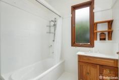 47 Dangar Street Armidale NSW 2350 $485,000 - $525,000 Perched atop the tranquil North Hill of Armidale, 47 Dangar Street offers a picturesque retreat with captivating views of the surrounding area. This inviting three-bedroom residence exudes character and warmth, making it an ideal haven for both first-time buyers and downsizers alike. Stepping inside, you’ll be greeted by a sense of timeless charm and comfort. The spacious layout encompasses three generously sized bedrooms, complemented by a versatile study area, catering perfectly to your modern lifestyle needs. The heart of the home lies within its country timber-style kitchen, where timeless elegance meets functionality. Here, culinary delights are effortlessly crafted amidst the warmth of rich timber accents. Convenience meets sophistication with two well-appointed bathrooms, strategically placed for accessibility and privacy. One adjoins the bedrooms at the front of the home, while the other sits adjacent to the laundry area. The rear of the residence unveils a spacious carpeted living room, adorned with exposed brick feature walls while double doors lead to the expansive undercover deck. Perfect for entertaining or simply unwinding in the tranquility of the outdoors, this space seamlessly blends indoor and outdoor living. Throughout the home, character features abound, including timeless floorboards, an inviting open fireplace, and charming exposed brick elements, adding a touch of elegance to every corner. Additional features include a convenient single carport, ducted gas heating for year-round comfort, a practical garden shed for storage needs, all nestled on a generously sized block of 690 square meters.