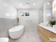 18 Grace Ave Point Clare NSW 2250 $1,050,000 - $1,100,000 Are you seeking a home that's move-in ready and exudes quality, elegance, functionality whilst being in a highly desirable location? 18 Grace Avenue, Point Clare has everything you've been looking for! The freshly painted exterior and roof, combined with the landscaped gardens and the abundant natural light throughout, all enhances the modern theme of this appealing property. Meticulous attention to detail has transformed this house into a truly exquisite home, don't let the opportunity to own this fantastic piece of real estate slip away. Your new home is waiting for you. The living room is consisting of a beautifully designed bay window with custom cushions, plantation shutters and fitted storage. This space also has split system air conditioning for all year-round comfort and an interactive servery style feature breakfast bar that connects seamlessly to the kitchen and dining area. A custom-designed eat-in style kitchen showcases three beautiful skylights, a gas cooktop, and an electric Fisher Paykel oven. With a ducted range hood, plantation shutters, ample storage featuring soft-close drawers and cupboards, it offers convenience and elegance. Integrated Bosch dishwasher and a feature dual sink complete the modern amenities of this kitchen. The bathroom is spacious and highlights a wall-hung dual vanity with soft close drawers, floor-to-ceiling tiles, and a freestanding bath, toilet and shower accompanied by a frameless shower screen. An undercover entertaining area provides the perfect space for year-round enjoyment, overlooking the pool and backyard, a delightful setting for the whole family to enjoy. Additional features: - 3 Bedrooms all with ceiling fans, 2 with wardrobes and all with venetian blinds. - External option for a home office or additional storage. - LED down lights are positioned throughout the home all with a dimmer option. - Oak veneer flooring in the communal spaces and carpet in the bedrooms. - Internal Laundry room, space for both washer and dryer, built in storage with sink. - Additional powder room with a second toilet and wall hung vanity. - Single carport - The Pool has a new lining, new coping, new pump and new filter. - The convenience of NBN Fibre to the Premises connected. - 6 Solar Panels Distances to note: - Point Clare Train Station, 1.5km approx - Point Clare primary school, 1.4km approx - Point Clare medical centre/chemist, 1.5km approx - Point Clare Aldi, 1.6km approx - Point Clare shopping precinct, 1.6km approx - Fagan Park Oval, 200m approx - West Gosford shopping centre 1.5km approx - M1 Pacific Mwy, 6.2km approx