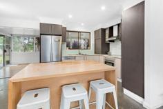 48 Meehan Drive Kiama Downs NSW 2533 $1,050,000 - $1,150,000 Presenting a fantastic opportunity to break into the local market, this single-level family home occupies a desirable locale with great proximity to local amenities. Being only a 4-minute drive to Jones Beach, this home is friendly to many living situations, including but not limited to first-home buyers, downsizers, holidayers or those looking to expand their investment portfolio. The property features a modern kitchen, office, two bathrooms, lounge and family room, an undercover entertainment area and a double garage. Accommodation features three bedrooms, with the master and third bedroom hosting an ensuite and the second bedroom complete with a BIW. A section of the double garage has recently been converted to a temporary home office or bedroom and currently has space for one vehicle. Being one of few properties in Kiama Downs that does not back onto neighbouring homes, the level backyard is surrounded by well-established trees and offers a sense of privacy and space, perfect for spending quality time with family and friends.