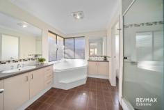 5 Patenier St Ashby WA 6065 Prepare to fall in love with this stunning 4-bedroom, 2-bathroom residence from the moment you arrive. Located in a whisper quiet street, this property offers style & space for the whole family & is simply in a league of its own. Features & benefits include: * Entrance with security screen * Formal lounge / home theatre with roller shutter * Spacious, open plan family & meals areas with reverse cycle, split system air conditioning * Stunning, designer kitchen with breakfast bar, stone benchtops with waterfall edge, double fridge/freezer recess with cold water feed, integrated dishwasher, walk in pantry, appliance hatch, 900mm freestanding SMEG oven & cooktop & shoppers’ access from the garage * Master bedroom, located at the rear of the property, with reverse cycle, split system air conditioning, sliding door leading out to the alfresco with black out blinds, twin walk-in robes & ensuite with corner bath, shower, twin vanities & separate WC * 3 further spacious bedrooms, 2 with sliding door robes & 1 with reverse cycle split system air conditioning * Family bathroom with shower, bath & vanity * Well-appointed laundry with walk-in linen / storage closet & roller shutters * 2nd WC * Further sliding door linen / storage closet * Ducted air conditioning * Ducted heating * Large solar electricity system * High quality vinyl plank flooring * Skirting boards * Alfresco * Further wrap around, undercover entertainment areas with power & gas point * Generous grass area * Easy care gardens * Double, remote garage * 570sqm block * Close to parks, transport, shops, schools, The Ashby Bar & Bistro & all other local amenities The current owners have poured their heart, soul and considerable investment into high-end renovations to create a home to be proud of.