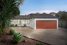 115 Centre Road Langwarrin VIC 3910 $700,000 - $770,000 Absolutely irresistible for the avid entertainer, this lovingly updated family home delivers easy modern living with an intuitive layout encompassing three distinct entertaining zones, a large covered alfresco and established gardens great for children. Superbly spacious across a single-level floorplan, the home opens to traditional proportions across a front living room, separate sunroom or dining space and a large rear family room perfect for hosting. Meshing with a partially covered alfresco complete with outdoor kitchen and heat strips, this rear entertaining mecca comes alive all year round to make entertaining easy. Complementing the outdoor facilities is a centrally-placed kitchen with garden window, freestanding gas cooker, dishwasher and breakfast bar, before accommodation finalises the home's interior. Anchoring parents to the front with a master bedroom comprising ensuite and walk-in robe, the three-bedroom two-bathroom layout includes a central family bathroom and large rear laundry. With gas ducted heating, split-system air conditioning and a double garage with additional off-street parking, this sensational family home enjoys proximity to The Gateway Shopping Centre, Langwarrin Park Primary and Woodlands Primary School and Elisabeth Murdoch College, along with public transport and local parks.