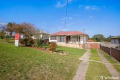 6 Prince Avenue Uralla NSW 2358 $370,000 - $405,000 Nestled in the serene countryside just a brief 20-minute drive from the vibrant city of Armidale, 6 Prince Avenue is situated in the heart of Uralla, a quaint country town known for its charm and community spirit, this inviting residence is poised to welcome you home. Key Features: Step into the bright and airy front living room, adorned with ample natural light pouring through large windows. Relax by the cozy wood fireplace, creating a warm and inviting atmosphere during cooler evenings. The heart of the home, the kitchen boasts functionality and convenience, seamlessly flowing into the adjoining dining area. Perfect for hosting family gatherings. With four well-appointed bedrooms, including a generously sized master, there’s room for everyone to rest and rejuvenate. The main bathroom offers a relaxing retreat with its bath, shower, vanity, and a private toilet for added convenience. Situated on a generous 784 square meter lot, the property features a large backyard, providing ample space for outdoor activities and potential expansion. A single lock-up garage offers secure parking, complemented by several garden and tool sheds, catering to all your storage needs. Whether you’re a growing family seeking space to flourish or an astute renovator with a vision, this property presents endless opportunities to create your dream home tailored to your unique lifestyle and preferences. Conveniently positioned in Uralla, residents enjoy easy access to local amenities, schools, and recreational facilities, while still relishing the peace and tranquility of country living. Discover the perfect blend of country charm and modern living at 6 Prince Avenue. With its generous interiors, outdoor oasis, and endless potential, this property invites you to embrace a lifestyle of comfort, convenience, and endless possibilities.