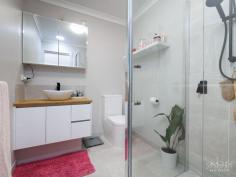 Unit 2/89 Mitchell St Wodonga VIC 3690 $569,000 Central living is a highly sought after lifestyle and it is rare to come across a townhouse finished off to this standard. Positioned at the rear of a two townhouse development and on its own title, this property offers a carefully considered and extremely practical floor plan with tasteful fixtures, fittings and colour scheme. Comprising of three bedrooms, the master suite is positioned to the front of the home and boasts a walk in robe and ensuite. A further two bedrooms both have built in robes and are serviced by the full family bathroom. The open plan living arrangement with the lounge, dining and kitchen all being central to each other creates a beautiful atmosphere with glass sliding doors providing access to the extensive and fully insulated alfresco, perfect for all seasons and occasions. The striking kitchen is the heart of the home and offers plenty of storage with a walk in pantry and an island bench for informal dining. Finished off with pendant lighting, stone benchtops, soft close cabinetry and stainless steel appliances including gas cooktop, electric oven and two draw dishwasher. With comfort in mind, the home has been fitted with ducted heating, evaporative cooling, ceiling fans and window furnishings throughout. A remote double garage will accommodate your vehicles with additional off street parking available and internal access for your convenience. Located in the heart of Wodonga and only moments to convenience stores, coffee shops, hospital precinct and public transport, this property offers a quiet and convenient lifestyle and we welcome your inspection and enquiry.