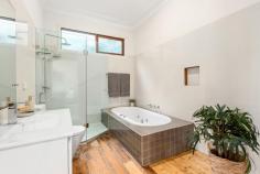 27 Chellow Dene Avenue Stanwell Park NSW 2508 This 5 bedroom home is perfectly positioned in a tranquil location on a quiet cul-de-sac, with the elevation providing beautiful views of the ocean and surrounding escarpment. Within minutes walk, you will find the stunning Stanwell Park Beach, picturesque parklands, popular cafes and so much more. HOME • This home features a versatile layout, with the top level comprising 4 bedrooms, 2 bathroom and plenty of indoor+outdoor living space, while the lower level with its own entry provides a large open living space with kitchenette, oversized bedroom and additional bathroom. Ideal for those who have regular guests or perhaps an extended families or older children. • The heart of the home is its open-plan living areas, which are designed to create a seamless connection between the living room, dining area, and the expansive outdoor deck area. This open concept not only optimises the space's flow, but also makes this home an exceptional venue for social gatherings and family activities. • Backyard is private and fully fenced. • Offstreet parking available behind a privacy gate. • If you appreciate a home with character, then this is the one for you. The home retains charming elements from the original cottage, adding a touch of nostalgia to your everyday life. LOCATION • One of Stanwell Park's most family friendly streets, being a quiet cul de sac with very little traffic and plenty of friendly long term residents. • Only a moment's stroll to the pristine Stanwell Park beach which is fully patrolled, offers fantastic surf breaks and is dog friendly. • You can leave the car at home as the local cafes, school, shops and restaurants are all only minutes from your front door. • The Royal National Park is situated just 10 minutes drive. • Stanwell Park is located approximately 1 hour South of Sydney CBD and approximately 30 minutes North of Wollongong CBD. • Embrace the quintessential coastal lifestyle and all that comes with it... swimming, fishing, bushwalking, hang gliding and family picnics in popular parklands all available only moments from your doorstep.