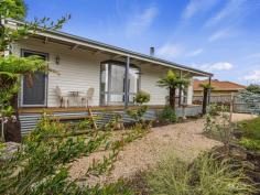 21 Miller Street Dumbalk VIC 3956 $460,000 Beautifully positioned on a quiet street is this charming 2-bedroom cottage. Set on a 703m2 block, with the cottage positioned to take advantage of the expansive back yard garden and views of the rolling green hills surrounding the beautiful Dumbalk township. A magnificent secure back yard to garden to your delight with permaculture garden principles in place, and established plantings of fruit trees, natives, herbs, and perennials. Charming and quirky with the former concrete water tank is now an opened-up garden shed hideaway, providing storage and options for a studio room perhaps! The single garage, with windows and veranda is a great extra workspace to relax and tinker to your hearts delight. The home features: - Front and rear decked verandas - Open plan kitchen, dining & living. - Fully appointed kitchen, with gas cook top, electric oven, dishwasher & double sink. - Wood fire to enjoy in those colder months & reverse cycle split system. - Both bedrooms have built in robes - The bathroom has an extra-large shower, vanity, and separate toilet. - Solar hot water with gas back up and double-glazed windows. - (2) new water tanks providing 32,500 ltrs of water storage in addition to town water - Excellent storage with refurbished concrete tank, garden shed & under house deck storage. - Fully fenced front yard and a brand-new rear fence, this is a neat secure block. This charming cottage has so much to offer the first home buyer, retiree, or investor. Located 8 minutes' drive from the thriving village of Meeniyan, 16 minutes to South Gippsland's major township of Leongatha and centrally based to the Latrobe Valley or to the coastal beaches of Inverloch or Waratah Bay.
