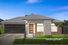 4 Greyfriars La Wollert VIC 3750 $700,000 - $750,000 A world of modern refinement and family-centric 4 Bedroom home, with two living spaces ensuring no shortage of room for family gatherings, relaxation or entertaining. A kitchen features gas cooking, a dishwasher, a walk-in pantry and a thoughtfully placed laundry, providing every culinary essential at your fingertips. Shifting life outdoors, glass sliding doors give access to the covered decked alfresco, offering a spacious outdoor entertaining area ideal for alfresco living and an easy-care yard primed for kids to play. This remarkable house features :- - Master Bedroom with ensuite shower, stone benchtop and walk-in robe - Other additional Bedrooms with built-in robes. - Central Bath with bathtub, shower and vanity. - Heaps of storage space with walk in linen. - Butler's Pantry - Quality fittings - Remote-controlled Double Garage - Heating and Cooling. - Open living and dining area. - Stylish Kitchen with 900mm Cooktop and rangehood - Dishwasher - Splashback in the kitchen. - High Ceilings and High Doors - Waterfall Stone Benchtop in kitchen, bathrooms - High-quality Fixtures and Fittings throughout. - Low-maintenance landscaped front and rear yards . -Impressive Facade It is an address perfectly positioned for convenience and growth. A place where you will take pride in your community and where your neighbors will become your friends.