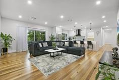 17B Karragata Court Tallebudgera QLD 4228 A statement of sleek, modern living in a prestigious and peaceful neighbourhood beckons with this superb 451m2 home. Nestled in a leafy setting of lush greenery, where towering forestry and fruit trees punctuate this 1.09acre oasis, the best of both worlds awaits here. You'll feel far removed from the urban rush of everyday life yet be only 15 minutes from picturesque Palm Beach. Designed with easy family living and entertaining in mind, an expansive kitchen with marble-effect Caesarstone waterfall benchtops and a 4 seater island bench sits at the heart of the home. Fitted with a butler's pantry, it makes catering an effortless affair. An outdoor courtyard with fire pit area and pizza oven tempts you when it's time for alfresco fun or host your guests on the expansive, tree-fringed deck and savour the serenity. Afterwards, grab a night-cap from the lounge room with wet bar accented by bronzed glass. There's also a light and airy dining room with feature downlights, an oversized formal living room, plus parents can escape to the upper-level retreat, fitted with plush carpet. Four light and bright bedrooms and four contemporary, customised bathrooms add another layer of impressive elegance to this home. The sprawling master suite sanctuary spoils you with an ensuite with twin shower heads, deep soak bathtub and separate toilet, with bedrooms 2 and 3 also with ensuites. Bedroom 4 and the fourth bathroom are located downstairs and gives your guests extra privacy. Along with an office, this home boasts two double garages (one with dual living potential), solar power, security system with CCTV footage and alarm, ducted air-conditioning, 22,000 litre water tank and a town water connection as well as an additional building envelope of 220m2. Situated 4km from Tallebudgera State School and 7km from St Andrews Lutheran College, it's also a quick drive to local shops, sporting fields and amenities. Or make the 10km trip to popular Palm Beach and savour the local cafes, restaurants and boutique shopping on hand in this coastal paradise. Arrange your inspection today. Main House Features Expansive, modern kitchen with marble-effect Caesarstone waterfall benchtops and a 4 seater island bench and six-burner oven/cooktop Butler's pantry with ample storage, separate sink and dishwasher Light and airy dining room with feature downlights Oversized formal living room overlooking entertaining deck (with speakers) Lounge room/multimedia room with built-in speakers, powder room and large wet bar accented by bronzed glass Spacious upper-level living/parents retreat Sprawling master suite with makeup area and a large dressing room Master ensuite with twin shower heads, deep soak bathtub, customised dual sink vanity and separate toilet Bedrooms 2 and 3 with ensuites – 1 with a built-in robe and 1 with a walk-in robe Bedroom 4 (downstairs) with built-in robe Office with custom cabinetry Large laundry with chute from the master bedroom Modern bathroom with shower, deep soak bathtub and customised stone vanities Expansive deck with Newport HardiFlex flooring overlooking established gardens Outdoor courtyard with fire pit area and pizza oven Attached 2 car garage with electric door and built-in storage Another 2 car garage opposite the house with dual living potential (has electricity, plumbing and gas) Other Features External greenhouse plus over 70 fruit trees planted Steel frame build Tongue'n'groove Blackbutt hardwood flooring throughout Plush carpets all bedrooms and upstairs living areas 2.7m high ceilings throughout the property and 3m in garage Under stair storage LED lights, vacumaid and 9.99 kilowatt solar system Commercial zoned, reverse cycle ducted air conditioning throughout 3 Phase Power Envirocycle, 22,000L water tank for irrigation and town water connection Security system with CCTV footage and alarm Additional building envelope of 220m2 Location 4km from Tallebudgera State School 7km from St Andrews Lutheran College Quick drive to local shops, sporting fields and amenities 10km to popular Palm Beach cafes, restaurants, beaches and boutique shopping