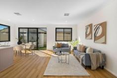 33 Tarranna Ave Plympton Park SA 5038 $797,500- $820,000 Torrens Titled with a street frontage position along the tree-lined Tarranna Avenue, this brand-new courtyard home is super sleek from start to finish. A crisp white façade with timber accents offers instant street appeal before a front porch entry opens to reveal a central hallway lined with timber floors. Enjoying front position and a lovely street outlook, a comfortable master bedroom is complete with a walk-through robe and beautiful ensuite bathroom with floating vanity and full-height tiling. A further two bedrooms are serviced by a spacious main bathroom with deep freestanding bath, shower and large vanity. Open, airy and flooded with natural light, a north-facing kitchen, dining and living space is warm and welcoming, arming home cooks with a large gas cooktop, plenty of storage space and an island with dishwasher, breakfast bar and double undermount sink. Sliding doors open onto a private, easy-care courtyard with lawn strip and side access. Delight in the details: - Ducted reverse cycle air conditioning - Built-in robes to bedrooms 2 & 3 - Separate laundry with linen storage - Secure single garage with internal access + extra off-street parking Walk to Cowra Crescent Reserve, the bus, takeaway options and local shops, while the train, schools, Edwardstown Oval and Castle Plaza and Westfield Marion Shopping Centres are within easy reach. City commutes are simple, and the sparkling shores of Glenelg are within 5kms.