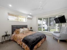 5 Spinks Court EIMEO QLD 4740 Elevated on the 'high side' of the street to capture the fresh breezes, this meticulously presented home is a must see. First impressions are lasting and the street appeal here is beautiful with terraced gardens and wide steps ushering you on to explore. Located in a quiet cul-de-sac, families will love everything on offer here. The undercover front porch is lovely for visitors and provides all weather entry. Stepping inside there is an air of calm in the lounge room. Featuring a huge window, the space feels open and inviting. The kitchen is the heart of the home. Decked out with sleek black stone benchtops and contrasting white cabinets, the décor is timeless. Meal preparation will be a pleasure with modern stainless-steel appliances and large pantry for storage. With so much bench space, entertaining 'buffet style' will allow family and friends to help themselves, wander out onto the patio and enjoy their meal. Then settle back, sip on a cool drink and enjoy the peace. Afterwards, laze back on an inflatable lounge and 'chill out' in the awesome sparkling pool. When the guests have left, it's time to head inside and spend family time together. Choose between two living areas, each so pleasant to enjoy in air-conditioned comfort. Adults can relax with a book or watch a movie in one zone. The kids can choose what they want to do, stream a movie, play a game, or just have a nap in their own room. Parents have a wonderful spacious master retreat, with private ensuite and a garden outlook through a gorgeous bay window. The remaining bedrooms are generous in size, nicely carpeted, and complete with built in robes and air-conditioning. There is a very practical family bathroom which includes a tub for the children. Terraced gardens add a lovely juxtaposition and interest to the back yard. Tropical palms and manicured lawns form a wonderful backdrop for the stunning in-ground pool. What a stunning spot to 'kick back' relax and cool off! Imagine sipping on a cocktail or a coldie, under the cover of the patio, while the BBQ sizzles for a simple Sunday lunch. The yard has been well planned with ample side access, sufficient for a pop top caravan, 'tinnie' or trailer. There is also a great size garden shed for the mower and garden equipment. Offering solar power and solar hot water, reducing your weekly running costs. This Eimeo location is fabulous and approx. a 5-minute drive to gorgeous, patrolled Eimeo Beach and the historic Eimeo Hotel. Local shopping precincts are approx. a 6-minute drive. Here you will find major supermarkets, numerous take-away options, chemist, newsagent, service stations and the lists continue. If you're looking for a timeless beauty with quality throughout. Don't delay, book an appointment today. Your family will love it! This fantastic family home is going to be HOT property.