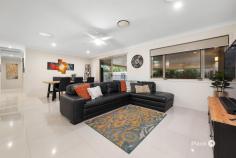 21 Lyrebird St Calamvale QLD 4116 Nestled in an established neighborhood, just a short 400m stroll from Brisbane City bus and Kameruka Street shops, this expansive single-story family home has undergone a contemporary renovation, focusing on lifestyle. Every detail has been carefully curated, resulting in a residence that surpasses new in every aspect. Step inside to discover a spacious, flowing floor plan designed for practicality and appeal to growing families. Featuring four generous bedrooms, including a master retreat with a walk-in robe and private ensuite. The two luxurious bathrooms create a hotel-like ambiance, showcasing high-quality fixtures, a freestanding bath, and stylish floor-to-ceiling tiles. Multiple living areas, including an oversized lounge room, separate family room, and spacious dining area, offer plenty of space for family activities. The heart of the home is the entertainer's kitchen, featuring stone benchtops, a breakfast bar, a ducted range hood, and 2PAC cabinetry. This culinary haven opens seamlessly to a large covered outdoor patio, ideal for alfresco dining and overlooking a resort-style pool with a separate turfed area for leisure activities. The in-ground pool, under ten years old and solar-heated for year-round enjoyment, provides a perfect backdrop for entertaining family and friends. Luxury Vinyl planking in the bedrooms and polished tiles throughout the rest of the home showcase a sophisticated yet grounded design. Plantation shutters add a touch of elegance, while Crimsafe security screens offer peace of mind without compromising aesthetics. Zoned ducted air conditioning ensures comfort throughout the seasons. Situated on a level 750m² lot with a desirable north/south aspect and wide 19m frontage, this property offers privacy from neighbors, rear yard access, and potential for add-ons like a granny flat. The home's 10kW solar system adds an eco-friendly touch to this impressive package. Ideal for savvy buyers seeking a turnkey property with no need for further renovations, this home blends classic charm and quality on a premium lot. With the owners moving on, seize the chance to secure this meticulously upgraded residence for your family's next chapter.