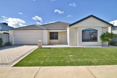 14 Colreavy Ramble Baldivis WA 6171 $675,000 Discover a great opportunity to step into the housing market with this charming 4-bedroom, 2-bathroom home nestled in Baldivis Central. Built by the Ventura Home Group in 2010, this property exudes a welcoming ambiance with its tasteful neutral decor. Highlights include a separate enclosed theatre room, a spacious master suite, and an open-plan design that seamlessly integrates the family, dining, and kitchen areas, where stone benchtops, a 5-burner gas hotplate, and stainless steel appliances await. Additional comforts include ducted evaporative air conditioning, a convenient shoppers' entry to the kitchen, and a newly landscaped low-maintenance garden. Embrace the lifestyle you've been dreaming of in this immaculate Baldivis residence, perfect for both relaxation and entertaining. • Ducted evaporative air conditioning throughout • Separate living areas including a theatre room and open plan living area • Large kitchen with double fridge recess, stainless steel appliances, dishwasher, stone bench tops, and ample cupboard space • Huge master suite with his/hers walk-in robes and a deluxe ensuite with bath, twin sink vanity, shower, and separate WC • Bedrooms 2 and 3 generously double-size, while the king-size 4th bedroom offers a walk-in robe • Walk-in linen in the laundry provides extra storage space • Access to the rear through the garage • Low maintenance gardens and freshly laid lawn front and back • Enjoy entertaining under the alfresco, which is also suitable for outdoor dining • 512sqm block of land with 169sqm of internal living space