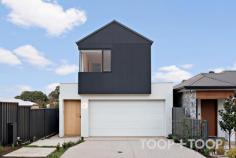 2F Egerton Ave Rostrevor SA 5073 Architecturally designed by the award winning Regent Homes, each fixture and fitting has been meticulously selected and is evident upon entering this stunning home constructed in 2023. Boasting a family sized floor-plan and sitting on an impressively sized block of 434sqm; there is plenty of room across both levels allowing privacy, space and flexibility for growing families. As you approach the front door via the stunning cantilever concrete steps and enter, you will instantly be in awe of the modern, crisp white and stone aesthetic complimented by stunning polished concrete floors. The four bedrooms are carpeted with built in wardrobes, and oversized windows eliminating the use for all day lighting. Enjoy the spacious main bedroom located on the ground floor showcasing a large walk-in robe and luxurious ensuite bathroom complete with terrazzo tiles imported from Italy, a dual-shower head, frameless shower screen and dual vanity. Transcend upstairs via the oak timber staircase into a large second living space fitted with easy clean engineered timber floors, perfect for a children’s retreat or extra guest entertaining space. The three bedrooms on this level share a gorgeous main bathroom complete with freestanding bathtub and a stunning tiling and fixture combination we are sure you'll love. The spacious downstairs living area incorporates a stunning oversized curved stone bench with plenty of room to prepare meals and entertain your guests. SMEG appliances set the bar high with style and functionality flowing through into the concealed butlers pantry which offers a built in bar, an abundance of storage along with a hidden sink and dishwasher. Avid entertainers will appreciate the undercover alfresco with built in gas line and outdoor fan. The spacious rear yard features a sparkling, electric heated swimming pool and large lawn to unwind with family and friends. Here's your opportunity to not only own an exceptionally crafted, custom-built home, but a chance to be part of a great community within this well loved location. Walk to Morialta Conservation Park on weekends, find your favourite coffee shop nearby and enjoy a selection of top-tier schooling options at your fingertips with Rostrevor College, Saint Ignatius College, Stradbroke Primary School and the brand new Morialta Secondary College just to name a few. Less than 5-minutes drive discover the well equipped Newton Shopping Centre or Firle Plaza, as well as the vibrant Parade in Norwood for shopping, café, specialty stores and weekend entertainment options. Added benefits include: *Family-sized electric heated swimming pool *Double car garaging *High fencing for privacy *Ducted and zoned, reverse cycle heating and cooling *2.7m ceiling heights *Semi commercial windows frames *Downstairs powder room with third toilet *Quality flooring throughout including polished concrete and imported terrazzo tiles *New sheer curtains *Separate downstairs laundry *Built in roof provisions for solar