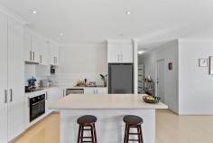 17 Vaucluse Way Coodanup WA 6210 $549,000 This low maintenance home offers a harmonious blend of comfort and style, perfect for families or investors alike. As you step inside, you'll be greeted by the open-plan living space that is generously sized, bathed in natural light, and equipped with a reverse cycle split system air conditioner for year-round comfort. The heart of the home lays within the kitchen, a central hub, complete with a breakfast bar, ample cabinetry, and stainless steel appliances. The lounge and dining areas seamlessly connect to the alfresco space, creating the perfect flow for entertaining. The master bedroom, located at the front of the home, is private and features its own reverse cycle air-conditioner, a walk-in robe, and a spacious en-suite with a vanity basin, shower, and separate toilet. Three additional bedrooms, each with built-in robes, offer comfortable living spaces. The family bathroom includes a bath, shower, vanity basin, and a separate toilet adjacent to the laundry. Outdoor entertaining is effortless with an alfresco area, and a backyard perfect for children and pets with plenty of space and lawn. Enjoy roller door access from the rear of the double garage and plenty of driveway for additional parking. This property offers an unbeatable lifestyle, just moments to the Peel Estuary, perfect for water activities such as crabbing, boating and nature walks, and is conveniently located a short drive from schools, shops, and amenities.