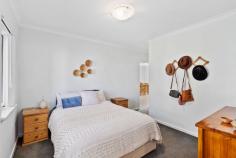 17 Vaucluse Way Coodanup WA 6210 $549,000 This low maintenance home offers a harmonious blend of comfort and style, perfect for families or investors alike. As you step inside, you'll be greeted by the open-plan living space that is generously sized, bathed in natural light, and equipped with a reverse cycle split system air conditioner for year-round comfort. The heart of the home lays within the kitchen, a central hub, complete with a breakfast bar, ample cabinetry, and stainless steel appliances. The lounge and dining areas seamlessly connect to the alfresco space, creating the perfect flow for entertaining. The master bedroom, located at the front of the home, is private and features its own reverse cycle air-conditioner, a walk-in robe, and a spacious en-suite with a vanity basin, shower, and separate toilet. Three additional bedrooms, each with built-in robes, offer comfortable living spaces. The family bathroom includes a bath, shower, vanity basin, and a separate toilet adjacent to the laundry. Outdoor entertaining is effortless with an alfresco area, and a backyard perfect for children and pets with plenty of space and lawn. Enjoy roller door access from the rear of the double garage and plenty of driveway for additional parking. This property offers an unbeatable lifestyle, just moments to the Peel Estuary, perfect for water activities such as crabbing, boating and nature walks, and is conveniently located a short drive from schools, shops, and amenities.