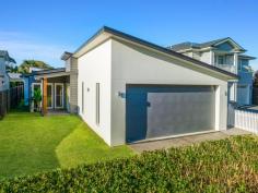 21 Railway Avenue Minnamurra NSW 2533 $2,200,000 Get the golf clubs, SUP board, kayak and fishing dinghy ready for your relaxed Minnamurra lifestyle in this architectural home designed by Nadine K Design and constructed by the renowned MS Building. Crafted all on one level, this solar passive home with soaring ceilings, Velux skylights, louvre windows and northerly aspect make this a really comfortable home to reside in through all seasons of the year. The home reveals impressive proportions throughout, offering seamless undercover indoor/outdoor living spaces while also providing abundant indoor living spaces and five generously proportioned bedrooms. The home comprises an awe-inspiring living and dining area, a gourmet kitchen complete with a walk-in Butler's pantry, high-quality appliances and enormous stone benchtops, a family room and two undercover alfresco areas. Outside you will find an easy-to-maintain backyard and pool paired with appropriate lounging spaces and an aspect you are sure to revel in. Additionally, the large two-car garage comes complete with 3 phase power, and a super-fast Tesla charger accompanied with solar panels to reduce your day-to-day living costs. Accommodation comprises five generous bedrooms, four of which are appointed with built-in wardrobes and fans. The oversized master suite is complete with a fan, walk-in wardrobe, ensuite and pendant bedside lighting. Only moments away from the shores of Pristine Minnamurra River, this happy home enjoys close proximity to neighbourhood shops, cafe, golf club, quality primary school, rail transport and scenic coastal walks. This home has the lot! Don't be disappointed, call now for your private viewing.