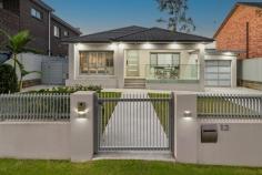 12 Palmer Street Sefton NSW 2162 Recently built capturing the essence of pure luxury and desirability, this well-designed brick residence unveils a sublime collection of substantial proportions and quality finishes. It spans a flowing single level layout and offers immersive indoor/outdoor entertaining with an all-season alfresco, this is a home that truly ticks all the boxes. – Keyless entry, four good-sized bedrooms, bult-in wardrobes, large master bedroom with ensuite – Naturally lit open plan lounge dining area with gas fireplace, bi-fold doors leading to pool area – Semi-enclosed alfresco with timber decking and ceiling fan – Bespoke kitchen features SMEG appliances, stone benchtops, dishwasher and Billi tap – Main bathroom with Parisi tapware, wall hung pan, freestanding bath, floor-to-ceiling tiles – Daiken Ducted air-conditioning, downlights, Italian tiled flooring throughout, Velux skylights – Amazing in-ground heated swimming pool with spa surrounded by 40mm Turkish Travertine flooring. – Electric gate, epoxy finished driveway to tandem double garage, front porch overlooks Sefton Golf Course – Land: 16.76m x 38.10m = 638.6sqm approximately – Peacefully located yet close to all everyday amenities, quality schooling, buses and cafes