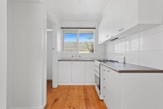 6/9 Wisewould Avenue Seaford VIC 3198 $470,000 - $517,000 An easy walk to the beach, foreshore and creekside walking trails as well as major shops and the train station, this two-bedroom unit is set to deliver a fabulous life of leisure and convenience on the fringe of Frankston city centre. Just a 10-minute stroll to a long sandy beach and the foreshore walk that stretches between Frankston's Long Island to Seaford's chic shops, cafes, pier and beyond, the joys of bayside living are moments from your door, along with walking trails leading to Seaford shops alongside Kananook Creek. A reserve, playground and primary school just doors away, make the property ideal for single parents, couples and young families, while easy access to Frankston Freeway, Eastlink and the train station provide an easy 45 min trip to the city for commuters. Inside, a freshly refurbished interior has added a crisp white colour scheme to polished floorboards for timeless style including a good-size lounge and dining area with split system heating/cooling, a kitchen with gas stove and sparkling white bathroom with a shower over the bath. A rear courtyard offers space to create your own lovely alfresco area or veggie beds, while a carport comes with a storage cupboard.