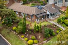 28 Patrick Auld Dr Auldana SA 5072 $1,650,000 This stunning four-bedroom solid brick home is situated on a generous 1294sqm corner allotment. Spacious and fully renovated, it is an amalgamation of charm, functionality, and location. Exceptionally crafted to embody a seamless flow from indoor spaces to the outdoors, this home offers an enthralling panorama of the city and ocean that can be glimpsed from virtually every window. Central to the home’s practical layout is a modern designer kitchen with state-of-the-art appliances, Caesarstone benchtop and marble splashback. The airy, light-filled contemporary dining and living spaces offer an expansive family setting. A generously proportioned master suite with an up-to-date ensuite, walk-in robe and attic storage is the perfect “parents’ retreat”. Two of the three further bedrooms feature built-in robes, and are all generous in size. Further features to appreciate: + A separate teenage retreat/music room affording privacy and space. + Large formal entertaining areas equipped with a fireplace and gas heating, as well as a casual dining room and TV area, and a library deck. + Spacious modern family bathroom with a separate bathtub and toilet. + A 6.0KW solar array ensuring low-cost energy. + Tesla battery storage for solar system + Low-maintenance paved and lawn areas, perfect for outdoor activities and future extensions. + A double garage under the main roof with automatic roller doors for convenience and security. + A variety of mature fruit trees including plums, mandarin, nashi pears, apple, persimmon and apricot. + Separate workshop/ storage shed. + This location is devoid of ugly overhead electrical street wiring, providing uninterrupted views. + Built on solid concrete footings, this home is built to stand the test of time. This property's location enhances its exclusivity, being only a short distance from the Norwood Parade, public transport, many desirable shopping precincts and as little as a 10 minute commute to CBD. Zoned for Magill School and Norwood International High School, adding a vital educational advantage. Enjoy an enviable lifestyle where every luxury is just within your reach!