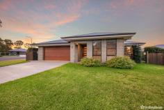 2 Burrell Court Armidale NSW 2350 $950,000 - $1,045,000 Welcome to 2 Burrell Court, a stunning family residence situated in the highly sought-after Foothills Estate of Armidale, perched high on North Hill. This prominent, oversized home offers the epitome of modern living with its thoughtful design and exceptional features. Boasting four spacious bedrooms, each equipped with built-in wardrobes, this home is perfect for a growing family. The master suite is a true retreat, featuring a generous walk-in wardrobe and a huge ensuite with a separate private toilet. Two additional bathrooms are strategically spread throughout the home, ensuring convenience and privacy for all family members and guests. Upon entering, you are greeted by a versatile front room that can easily be converted into a media room, home office, or visitor retreat, providing flexible living options to suit your lifestyle. The heart of the home is the expansive open-plan kitchen, dining, and living area. The modern kitchen is a chef’s dream, complete with an island bench, a walk-in pantry, a double-door fridge space with plumbed-in options, and gas cooking facilities. The dining and living areas are enhanced by elegant dark wood flooring and neutral tones, creating a warm and inviting atmosphere. Additional features of this impressive home include, a walk-in linen press for ample storage, double lock-up garage with internal access, ducted reverse cycle air conditioning for year-round comfort, gas hot water system, an outdoor undercover alfresco area perfect for entertaining, a raised concrete BBQ area for family gatherings, immaculate lawns and gardens enhancing the overall appeal and a large block size of 1,228 square meters, providing plenty of space for outdoor activities. 2 Burrell Court is more than just a house; it’s a place to create lasting memories. Experience the best of Armidale living in this beautiful home, where every detail has been carefully considered to offer comfort, convenience, and style. Don’t miss the opportunity to make this exceptional property your own.
