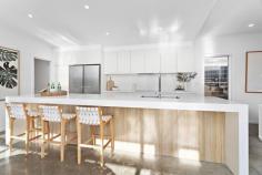 21 Railway Avenue Minnamurra NSW 2533 $2,200,000 Get the golf clubs, SUP board, kayak and fishing dinghy ready for your relaxed Minnamurra lifestyle in this architectural home designed by Nadine K Design and constructed by the renowned MS Building. Crafted all on one level, this solar passive home with soaring ceilings, Velux skylights, louvre windows and northerly aspect make this a really comfortable home to reside in through all seasons of the year. The home reveals impressive proportions throughout, offering seamless undercover indoor/outdoor living spaces while also providing abundant indoor living spaces and five generously proportioned bedrooms. The home comprises an awe-inspiring living and dining area, a gourmet kitchen complete with a walk-in Butler's pantry, high-quality appliances and enormous stone benchtops, a family room and two undercover alfresco areas. Outside you will find an easy-to-maintain backyard and pool paired with appropriate lounging spaces and an aspect you are sure to revel in. Additionally, the large two-car garage comes complete with 3 phase power, and a super-fast Tesla charger accompanied with solar panels to reduce your day-to-day living costs. Accommodation comprises five generous bedrooms, four of which are appointed with built-in wardrobes and fans. The oversized master suite is complete with a fan, walk-in wardrobe, ensuite and pendant bedside lighting. Only moments away from the shores of Pristine Minnamurra River, this happy home enjoys close proximity to neighbourhood shops, cafe, golf club, quality primary school, rail transport and scenic coastal walks. This home has the lot! Don't be disappointed, call now for your private viewing.