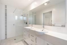 116/34 Ardrossan Road Caboolture QLD 4510 $899,000 Welcome to this lovely architecturally designed home, spanning approximately 224m² with three bedrooms, including walk-in robes, two and a half bathrooms, and a double car remote control garage. Conveniently located in arguably the best corner of this fantastic Halcyon Glades resort style community. Approximately 50 meters away from the modern recreational facilities (includes gym, heated pool, spa, cinema, clubhouse, library, tennis, gardening, men’s shed and much more). This beautifully maintained residence offers a peaceful and secure living environment with a state-of-the-art integrated phone, front gate, and intercom system. The house features 2550mm high ceilings throughout, paired with LED downlights in living areas and bedrooms, creating a bright and inviting atmosphere. Ceramic tiles line the porch, patios, entry, kitchen, living areas, laundry, bathrooms, and WC, ensuring both durability and style, while carpet provides comfort in other spaces. This home combines modern amenities with meticulous attention to detail, offering a comfortable and stylish retreat for its residents. Situated in an open plan living area, The kitchen features a coloured glass splashback that adds a touch of sophistication, complementing its elegant stone benchtops with a waterfall edge. High-end stainless-steel appliances, including an oven, electric cooktop, dishwasher and microwave, enhance the cooking experience, while an externally vented rangehood ensures a fresh cooking environment. • 3 bedrooms with WIR’s, 2 and a half bathrooms with full height tiling, polished mirrors, double towel rails, double and single semi-recessed basin. • Zone ducted air-conditioning, with ceilings fans to main bedroom, 2nd bedroom, living room and dining room. • Key lockable windows and external sliding glass doors with insect screens. • Electric 160 litre hot water system. • External walls clad with acoustically and thermally rated CSR Hebel. • Energy saving solar electrical system • Double-car garage with internal access • Low-maintenance gardens • Architecturally designed landscaped gardens, lawns and streetscape. This home is energy efficient and located in a gated community with various amenities and a strong sense of community spirit. Do not miss the opportunity to make this home yours.