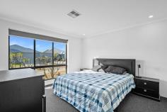 11 Lincelles St Madora Bay WA 6210 $749,000 Located in the highly sought after suburb of Madora Bay, this stunning 4 bedroom, 2 bathroom home built in 2021 by Smart Homes, offers an ideal opportunity for those seeking a sea change. The spaciousness of the home is truly highlighted by the impressive 31c ceilings in the main living areas, allowing natural light to flood the open plan family, dining, and kitchen areas, creating a bright and airy atmosphere. The centrally located kitchen features elegant stone benchtops, 900mm stainless steel appliances, a scullery and an abundance of cupboard space, ensuring a pristine and clutter free space. The master suite features a spacious walk-in robe, providing ample storage, while the ensuite is a standout feature with a double shower, double vanity, and a separate toilet, offering a private space to unwind and rejuvenate after a long day. Towards the rear of the home, an activity room connects to the three minor bedrooms. Bedroom 2 includes a walk-in robe, and bedrooms 3 and 4 are fitted with built-in robes. This area also includes the main bathroom and toilet, ensuring privacy and comfort for everyone. Additional features include a theatre room with double door entry, perfect for movie nights with friends and family as well as solar panel and Fujitsu ducted reverse cycle air conditioning for year round comfort and energy efficiency. Situated on a 450 sqm block with a 3.6 metre side access, ideal for storing the boat or caravan, and a double garage with extra height and a workshop area, providing ample space for storage and DIY activities. Don't miss your chance to own such a beautiful home located within walking distance to the upcoming St Marcellin's Catholic College that is currently under construction, the picturesque Madora Bay Foreshore, and the vibrant Lakelands Shopping Centre.