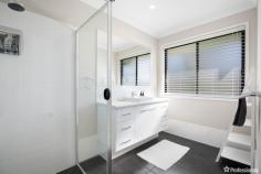 2 Burrell Court Armidale NSW 2350 $950,000 - $1,045,000 Welcome to 2 Burrell Court, a stunning family residence situated in the highly sought-after Foothills Estate of Armidale, perched high on North Hill. This prominent, oversized home offers the epitome of modern living with its thoughtful design and exceptional features. Boasting four spacious bedrooms, each equipped with built-in wardrobes, this home is perfect for a growing family. The master suite is a true retreat, featuring a generous walk-in wardrobe and a huge ensuite with a separate private toilet. Two additional bathrooms are strategically spread throughout the home, ensuring convenience and privacy for all family members and guests. Upon entering, you are greeted by a versatile front room that can easily be converted into a media room, home office, or visitor retreat, providing flexible living options to suit your lifestyle. The heart of the home is the expansive open-plan kitchen, dining, and living area. The modern kitchen is a chef’s dream, complete with an island bench, a walk-in pantry, a double-door fridge space with plumbed-in options, and gas cooking facilities. The dining and living areas are enhanced by elegant dark wood flooring and neutral tones, creating a warm and inviting atmosphere. Additional features of this impressive home include, a walk-in linen press for ample storage, double lock-up garage with internal access, ducted reverse cycle air conditioning for year-round comfort, gas hot water system, an outdoor undercover alfresco area perfect for entertaining, a raised concrete BBQ area for family gatherings, immaculate lawns and gardens enhancing the overall appeal and a large block size of 1,228 square meters, providing plenty of space for outdoor activities. 2 Burrell Court is more than just a house; it’s a place to create lasting memories. Experience the best of Armidale living in this beautiful home, where every detail has been carefully considered to offer comfort, convenience, and style. Don’t miss the opportunity to make this exceptional property your own.