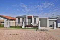 7/271-285 Tenth Street Mildura VIC 3500 $235,000 - $258,000 Welcome to Westside Gardens Residential Village, where refined living meets tranquility. This impeccably maintained unit graces the front of the complex, facing Tenth Street, and offers a remarkable blend of convenience and prestige. With laneway walking access to the lush grassy parkland and the Village Community Centre, you'll enjoy a harmonious connection to nature and a vibrant community. Designed exclusively for over 50's, this purpose-built residential village is nestled in a coveted blue-chip location, within easy reach of the CBD and essential services. Step inside this exceptional unit and be captivated by the thoughtful features that enhance your everyday living. The generous kitchen boasts a gas cooktop and dishwasher, allowing for culinary delights in an elegant setting. Neutral tones, complemented by modern fixtures and fittings, create a harmonious ambiance throughout. The master bedroom is a haven of tranquility with its spacious walk-in robe, providing ample storage space and a touch of luxury. The second bedroom features a built-in robe, combining functionality and style. Enjoy year-round comfort with the reverse cycle split system air conditioning and ceiling fans, ensuring a pleasant climate in any season. Outside, the remote access roller door of the garage offers secure parking, while a covered outdoor area invites you to unwind and revel in moments of relaxation. Westside Gardens Residential Village offers an array of amenities and services covered by a weekly maintenance fee of $110.50. Immerse yourself in the well-appointed community centre, featuring a kitchen and BBQ facilities, indoor sports activities, and outdoor entertaining areas amidst beautifully manicured lawns and gardens. The fee also includes Mildura Rural City Council Rates, encompassing all council services, as well as Lower Murray Water Sewage & Water Tariffs (usage costs borne by occupants). Each home is equipped with independent meters for all services, ensuring transparency and control. General village maintenance and a direct link to a security company and emergency services provide added peace of mind.