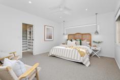 21 Railway Avenue Minnamurra NSW 2533 $2,200,000 Get the golf clubs, SUP board, kayak and fishing dinghy ready for your relaxed Minnamurra lifestyle in this architectural home designed by Nadine K Design and constructed by the renowned MS Building. Crafted all on one level, this solar passive home with soaring ceilings, Velux skylights, louvre windows and northerly aspect make this a really comfortable home to reside in through all seasons of the year. The home reveals impressive proportions throughout, offering seamless undercover indoor/outdoor living spaces while also providing abundant indoor living spaces and five generously proportioned bedrooms. The home comprises an awe-inspiring living and dining area, a gourmet kitchen complete with a walk-in Butler's pantry, high-quality appliances and enormous stone benchtops, a family room and two undercover alfresco areas. Outside you will find an easy-to-maintain backyard and pool paired with appropriate lounging spaces and an aspect you are sure to revel in. Additionally, the large two-car garage comes complete with 3 phase power, and a super-fast Tesla charger accompanied with solar panels to reduce your day-to-day living costs. Accommodation comprises five generous bedrooms, four of which are appointed with built-in wardrobes and fans. The oversized master suite is complete with a fan, walk-in wardrobe, ensuite and pendant bedside lighting. Only moments away from the shores of Pristine Minnamurra River, this happy home enjoys close proximity to neighbourhood shops, cafe, golf club, quality primary school, rail transport and scenic coastal walks. This home has the lot! Don't be disappointed, call now for your private viewing.
