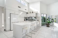 116/34 Ardrossan Road Caboolture QLD 4510 $899,000 Welcome to this lovely architecturally designed home, spanning approximately 224m² with three bedrooms, including walk-in robes, two and a half bathrooms, and a double car remote control garage. Conveniently located in arguably the best corner of this fantastic Halcyon Glades resort style community. Approximately 50 meters away from the modern recreational facilities (includes gym, heated pool, spa, cinema, clubhouse, library, tennis, gardening, men’s shed and much more). This beautifully maintained residence offers a peaceful and secure living environment with a state-of-the-art integrated phone, front gate, and intercom system. The house features 2550mm high ceilings throughout, paired with LED downlights in living areas and bedrooms, creating a bright and inviting atmosphere. Ceramic tiles line the porch, patios, entry, kitchen, living areas, laundry, bathrooms, and WC, ensuring both durability and style, while carpet provides comfort in other spaces. This home combines modern amenities with meticulous attention to detail, offering a comfortable and stylish retreat for its residents. Situated in an open plan living area, The kitchen features a coloured glass splashback that adds a touch of sophistication, complementing its elegant stone benchtops with a waterfall edge. High-end stainless-steel appliances, including an oven, electric cooktop, dishwasher and microwave, enhance the cooking experience, while an externally vented rangehood ensures a fresh cooking environment. • 3 bedrooms with WIR’s, 2 and a half bathrooms with full height tiling, polished mirrors, double towel rails, double and single semi-recessed basin. • Zone ducted air-conditioning, with ceilings fans to main bedroom, 2nd bedroom, living room and dining room. • Key lockable windows and external sliding glass doors with insect screens. • Electric 160 litre hot water system. • External walls clad with acoustically and thermally rated CSR Hebel. • Energy saving solar electrical system • Double-car garage with internal access • Low-maintenance gardens • Architecturally designed landscaped gardens, lawns and streetscape. This home is energy efficient and located in a gated community with various amenities and a strong sense of community spirit. Do not miss the opportunity to make this home yours.