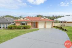 10 Margot Close Bolwarra NSW 2320 $840,000-$880,000 Located in a quiet Cul-de sac of Margot Close, sits this beautifully designed 4 bedroom, 2 bathroom multiple living space family home, ready and awaiting its new family. Situated close to local schools, shops, sporting fields and parks this gem in Bolwarra Heights will tick all the boxes! Walking into the house you are greeted with a light crisp colours, abundance of natural light, carpeted rooms and tiled main areas, split system air conditioning and 4 spacious rooms, master includes an ensuite and walk-in wardrobe, the kitchen/dining living area overlooks the back yard with the reserve views. Heading outside of the home, you will find an undercover entertainment area, fully fenced and secure yard perfect for kids or pets to run around in with the added bonus of a drive-thru garage which allows access to the rear of the yard.