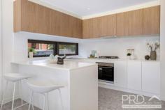 5 / 8-10 Flatrock Road Kingsgrove NSW 2208 Architecturally crafted, this brand-new freestanding residence enjoys an abundance of natural light and embraces luxury without compromise. Designed to deliver the utmost in comfort and quality. Offering a premier and perfectly situated address close to both Kingsgrove and Bexley North. Enjoying spacious accommodation and versatile indoor and outdoor living over two levels. This residence is a must see! * Full brick concrete construction downstairs, Dorma Hampton Style Upstairs * Three generous bedrooms with built in robes * Master suite features ensuite and full size walk-in robe * Full size main bathroom, tiled floor to ceiling with freestanding bathtub and separate shower * Gourmet kitchen with breakfast bar, gas cooking and quality appliances * Spacious open plan living & dining room * Outdoor alfresco entertaining area with pleasant outlook * Secure and child friendly, low maintenance yard * Double remote lock up garage with internal access * Features include; ducted air-conditioning throughout and security intercom