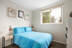 1A Arabil Street Frankston VIC 3199 $500,000 - $550,000 Tucked beyond street view and impeccably presented, this recently updated two-bedroom residence offers a tranquil sanctuary for discerning individuals in pursuit of comfortable living with a convenient address. Ideal for downsizers, first-time buyers or astute investors, this rear home of only two presents with modern interiors and attractive features. A hassle-free living experience awaits beyond a brick facade, revealing low-maintenance gardens and private interiors awash in natural light. Generous and open proportions embrace living and dining space where a warm neutral colour palette merges across a practical kitchen complete with stainless steel appliances, dishwasher and mosaic splashback. Two light-letting bedrooms share use of the stylish bathroom with dual basins and bathtub, where private ensuite access via the walk-in robe elevates the master bedroom. Split-system heating and cooling, a designated laundry with rear access, custom window furnishings, exposed aggregate patio, easy-care gardens and a single garage headline the features of this immaculately presented home. With St Johns Primary School at the end of the street and great coffee only a short stroll from home, enjoy proximity to the Beach Street shops, Karingal Primary School, Karingal Hub and Ballam Park, public transport and easy freeway access.