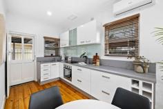 Unit 1/322 Anzac Hwy Plympton SA 5038 $500,000-$550,000 Central to city and sea with shops, schools, The Highway Hotel and the bus and tram on your doorstep, this superbly upgraded unit is an absolute must-see for investors or first home buyers. Enjoying the front position within a small corner allotment group, neat timber slatted fences and gated entry add privacy to a secluded front courtyard and porch. Inside, polished timber floors line a contemporary open and airy living, dining and kitchen space, where stunning northerly-aspect glass block windows welcome natural light, and plenty of sleek gloss cabinetry and a mint glass splashback have elevated the cooking quarters, complete with a split system air conditioner for added comfort. Two bedrooms begin with an attractive master option with modern built-in robes and a courtyard outlook, both with easy access to a central bathroom – also having undergone some upgrades – with floating vanity, shower with feature wall and convenient hidden laundry. Outside, a substantial decked alfresco under the protection of a pergola will surprise with its size; the prime possie to entertain or unwind and soak in those stunning summer sunsets. More to mention: - Built-in robes to bedroom 2 - Carport - Large rear shed - Secure private front and rear courtyards