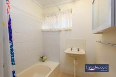 36B Stuart St Koongamia WA 6056 $449,000 Prepare to have your head turned and heartstrings plucked by this bright, uncomplicated property. Set beside the much-loved Heritage Trail and boasting a large, private backyard, this impeccably presented home is an excellent entry point to the property market, a wonderful downsizer and an unparalleled first home. 2 bedrooms 1 bathroom 1984-built brick and tile Open-plan kitchen & living Fresh light colour palette Split AC & gas bayonet Drive-through side access No-fees strata property Big fully fenced backyard 520 sqm level block Trail-side location A well-tended front garden planted with roses and lavender sets this home back from the road, and a driveway along one boundary leads through a gate to the fully fenced backyard. The garden surrounding the house is a surprise and a delight, offering outdoor living and entertaining in a fantastic setting, adjacent to the bridle trail. This property’s appeal grows as you step from the welcoming front porch into an open-plan kitchen, lounge and meals area. Good proportions, a fresh neutral colour palette and loads of natural light fashion an instantly welcoming sense of home. Dual-aspect glazing and a flowing floorplan heighten the sense of space and create a seamless link to the large backyard. The lounge sits at the front of the plan, with views of the front garden and modern sculpture lining the path of the Heritage Trail. Carpet and a gas bayonet add to a sense of comfort in the lounge, while the meals and kitchen have vinyl flooring. The kitchen has been updated and is a simple and practical space with glossy white cabinetry and tiled splashback, a freestanding oven, and a built-in pantry. A door from the kitchen leads to the small rear patio and generous backyard featuring a level lawn edged with garden beds, established trees, and a garden shed. One side of the plan has bedrooms arranged to the front and rear, with the main at the front featuring reverse-cycle air conditioning and a freestanding robe. The family bathroom and walk-through laundry with a separate WC sit between the two bedrooms off a hallway with a large linen press. Garden views bring a pastoral charm to the rear bedroom. Koongamia offers a magical mixture of foothills adventure and city convenience. This truly impressive and charming property combines easy access to Midland and beyond, hours of walking and riding along the Heritage Trail, and the convenience of nearby private and state schools. Surrounding streets are lined with lovingly renovated and renewed homes in an interesting and exciting neighbourhood experiencing a renaissance.